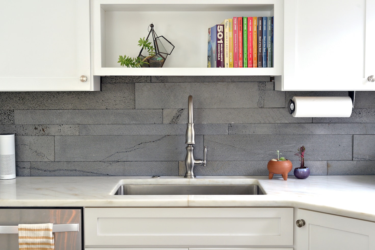 Modern White Kitchen with a Planc Platinum backsplash in Orlando